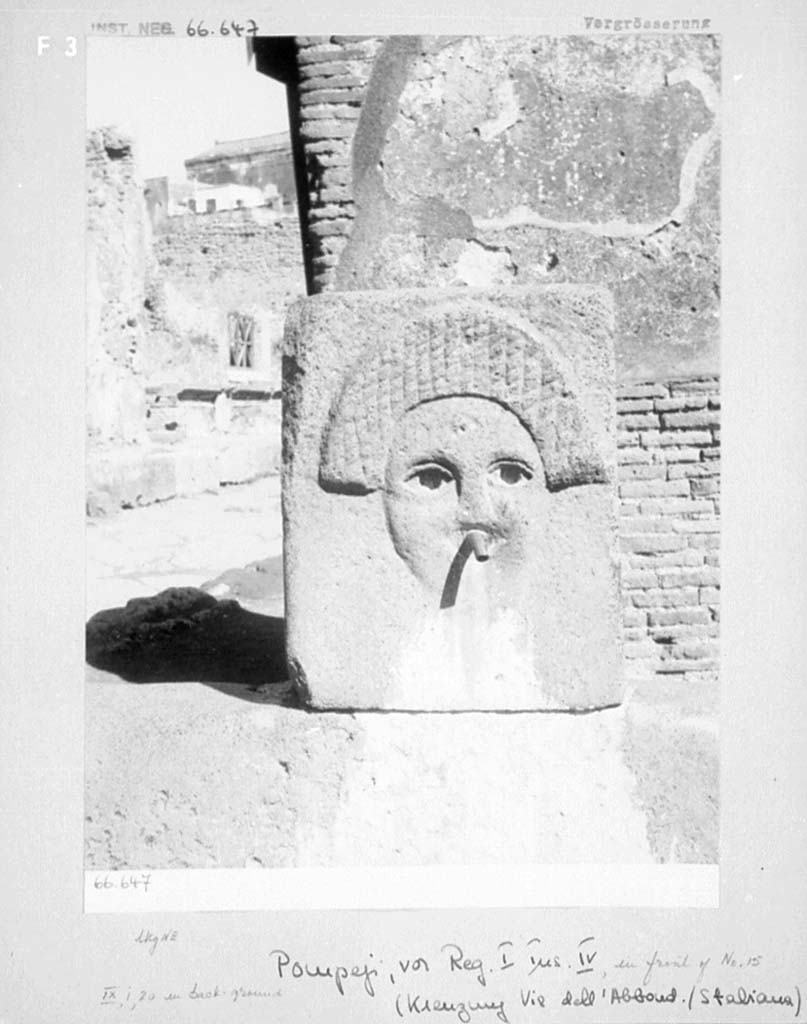Fountain outside I.4.15 on Via Stabiana, Pompeii. Fountain head with comedy mask.
DAIR 66.647. Photo  Deutsches Archologisches Institut, Abteilung Rom, Arkiv.
