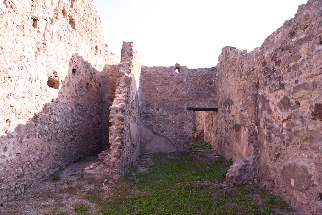 I.4.11 Pompeii. October 2019. Looking east towards area under stairs to upper floor, with latrine, on left, and rear room, on right.
Foto Tobias Busen, ERC Grant 681269 DCOR.
