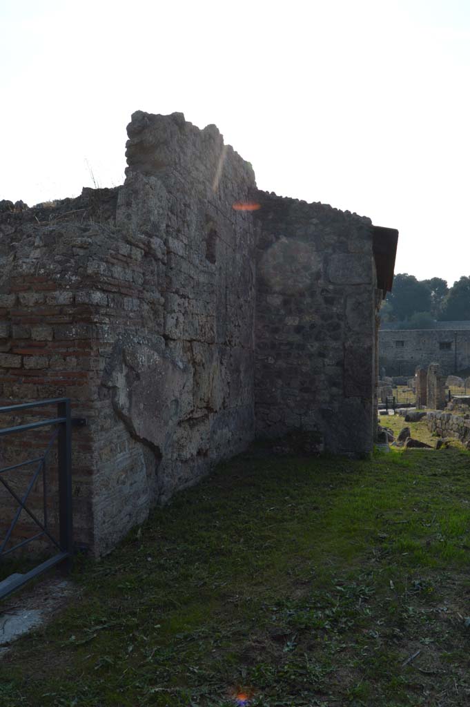 I.5.2 Pompeii, on left, with I.5.1, on right. October 2017. 
Looking west towards street altar, on east side of structure of I.5.1.
Foto Taylor Lauritsen, ERC Grant 681269 DCOR.

