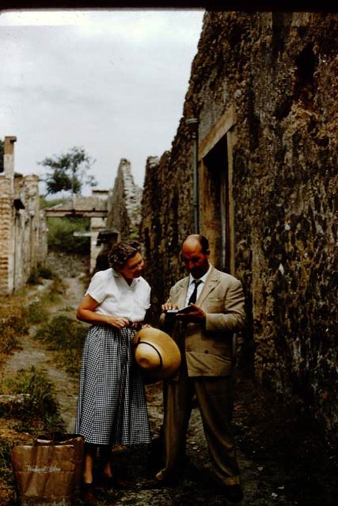 I.8.19 Pompeii. 1959. Wilhelmina and colleague outside entrance.
Vicolo dellEfebo, looking north towards Via dellAbbondanza. 
Photo by Stanley A. Jashemski.
Source: The Wilhelmina and Stanley A. Jashemski archive in the University of Maryland Library, Special Collections (See collection page) and made available under the Creative Commons Attribution-Non-Commercial License v.4. See Licence and use details.
J59f0494
