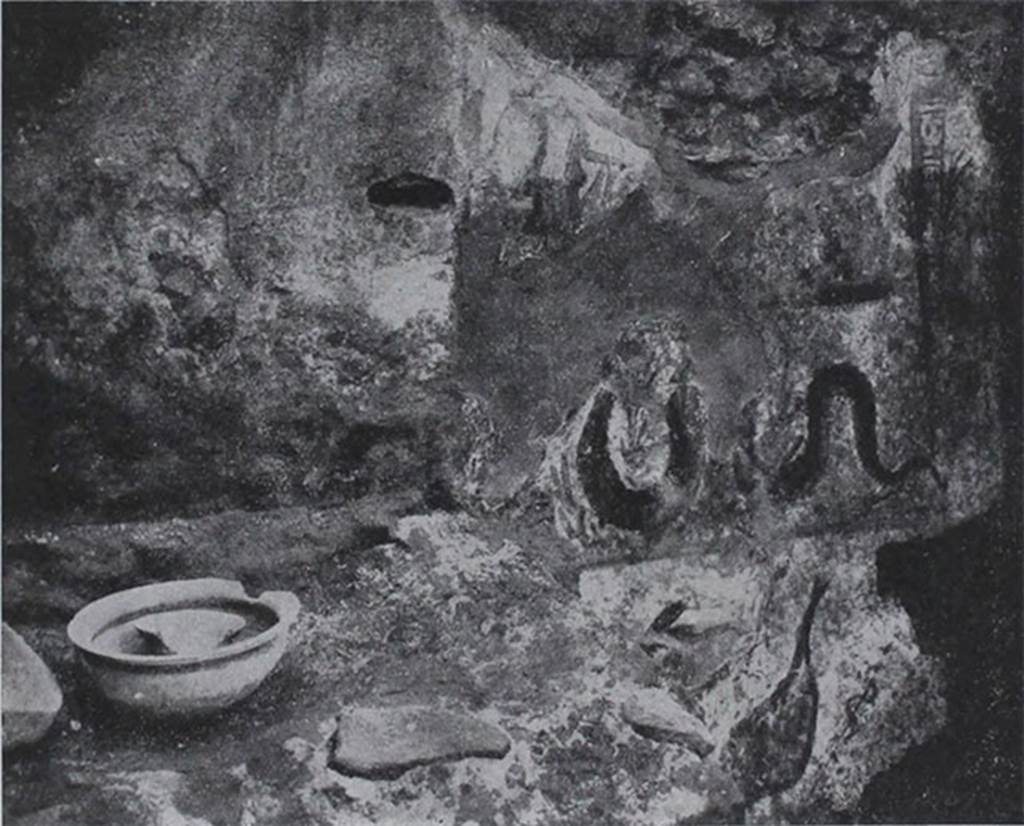 I.10.18 Pompeii. Lararium painting on south wall of the kitchen beside the hearth.
See Notizie degli Scavi di Antichit, 1934, p. 344, and fig.38.
