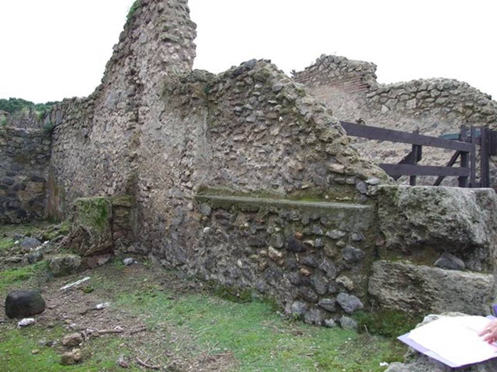 II.4.1 Pompeii. December 2006. Shop.  West wall with recess.