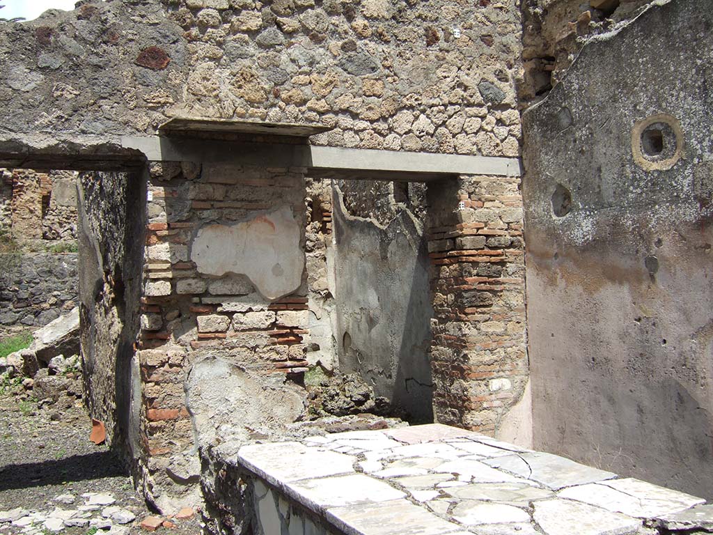 V.4.7 Pompeii. May 2006. North wall of bar room at rear of counter.