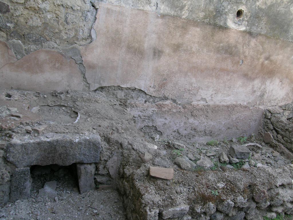 VI.16.3 Pompeii. June 2005. 
North-west corner with hearth and masonry remains of bench or basin/vat? Photo courtesy of Nicolas Monteix.
