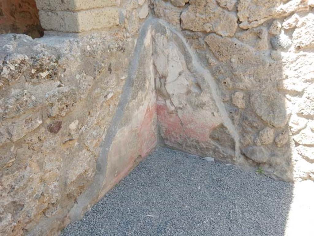 VII.1.25 Pompeii. May 2017. Remains of painted decoration in small room 28 in north-west corner of atrium, on west and north wall.  Photo courtesy of Buzz Ferebee.
