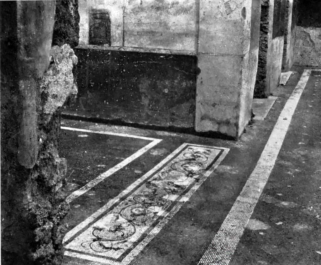 VII.1.40 Pompeii. c.1930. 
Looking north along west side of atrium, and threshold of west ala in black and white mosaic and polychrome tesserae.
See Blake, M., (1930). The pavements of the Roman Buildings of the Republic and Early Empire. Rome, MAAR, 8, (p. 60, 76, & 108, & Pl.18, tav 3).  
