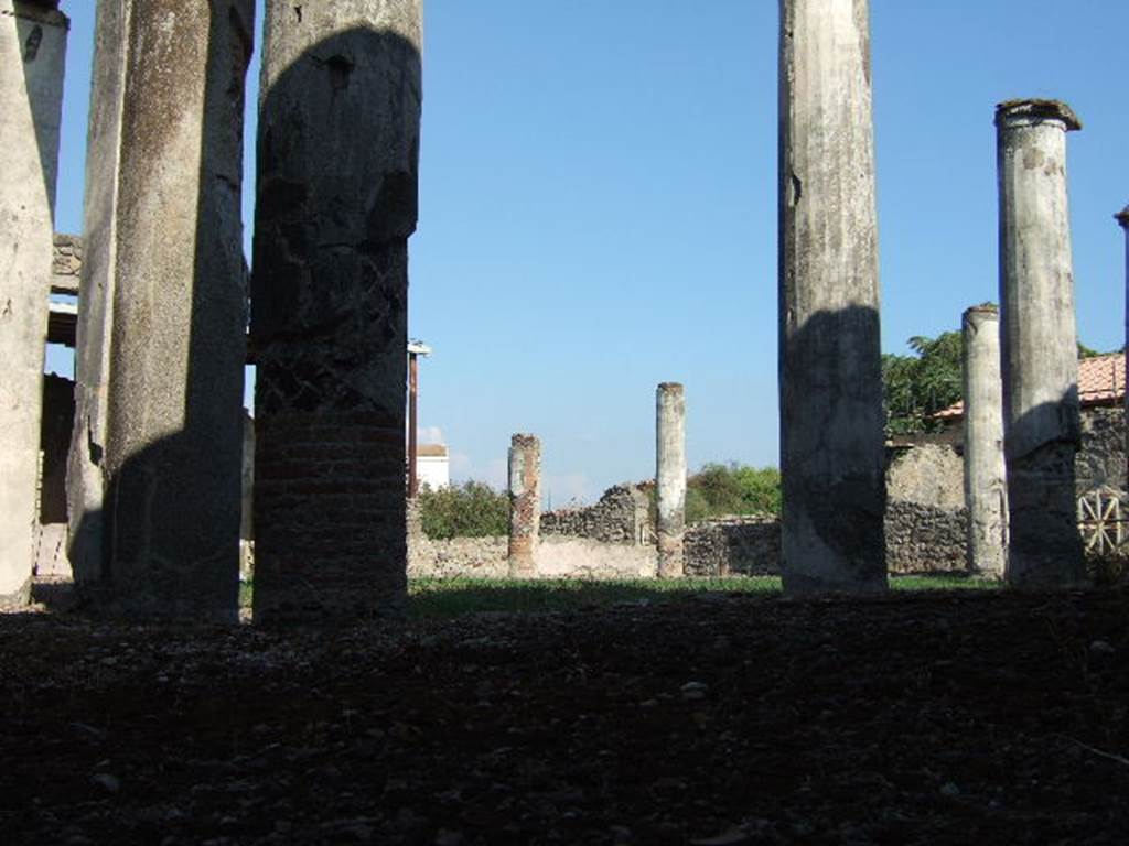 VII.1.40 Pompeii. September 2005. Looking south-east across peristyle through side window.