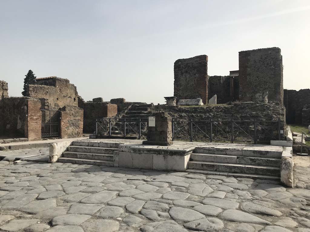 VII.4.1, Pompeii. April 2019. Looking east towards the Temple. 
According to Niccolini, the front platform of the temple would have had iron railings with gates at the altar end of each set of steps.
See Niccolini F, 1854. Le case ed i monumenti di Pompei: Volume Primo. Napoli, Tempio della Fortuna, Tav. I, p. 2.
Photo courtesy of Rick Bauer.
