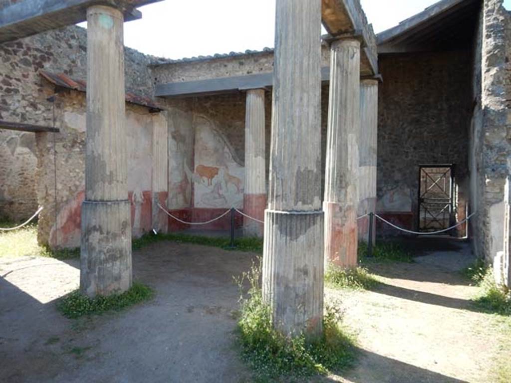 VII.7.10 Pompeii. May 2018. Looking from south portico, at rear of tablinum, towards rear entrance at VII.7.13, on right. 
The doorway to the kitchen area is on the left. Photo courtesy of Buzz Ferebee. 

