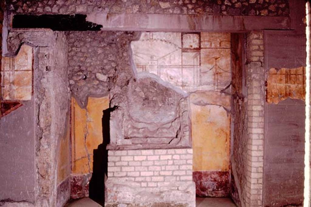 Oplontis, 1974. Room 27, looking towards west wall, and lararium with apse, in which was placed the masonry altar which held the symbols of the household gods. Photo by Stanley A. Jashemski.   
Source: The Wilhelmina and Stanley A. Jashemski archive in the University of Maryland Library, Special Collections (See collection page) and made available under the Creative Commons Attribution-Non Commercial License v.4. See Licence and use details. J74f0664
