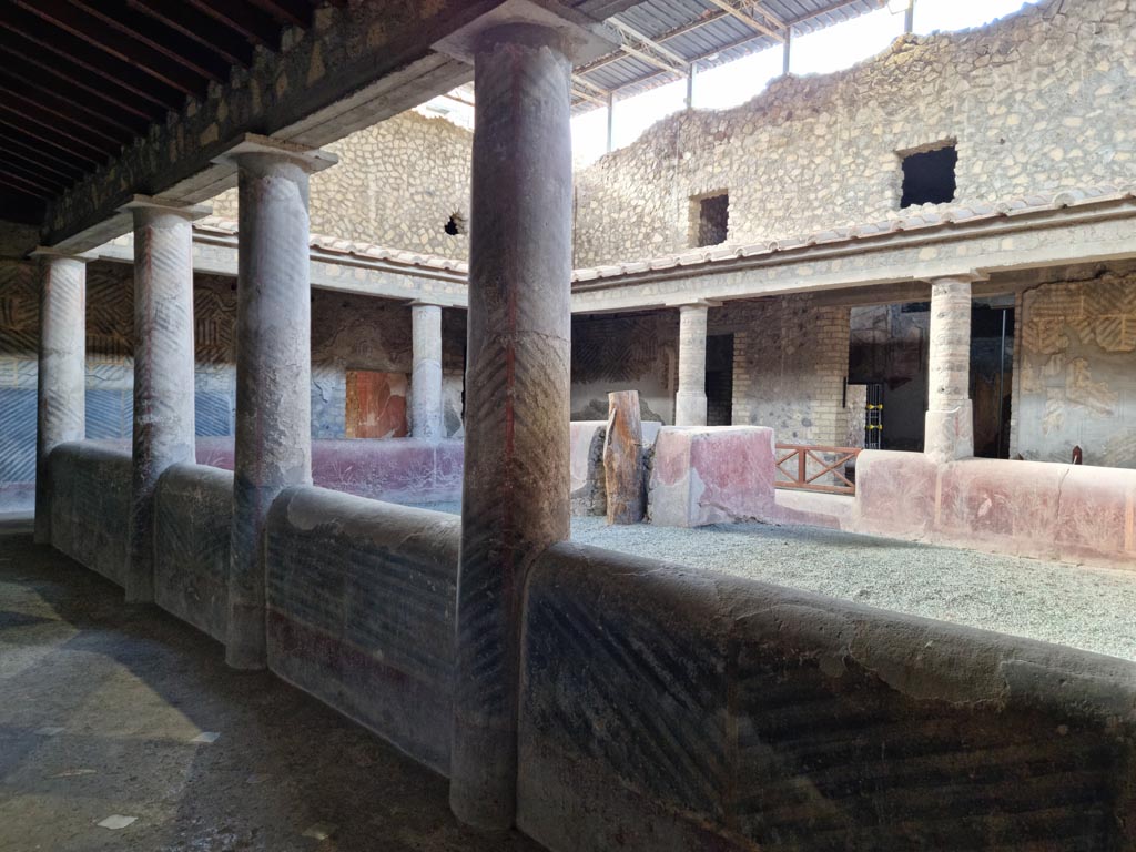 Oplontis Villa of Poppea, January 2023. Room 32, looking south along east wall of the rustic courtyard. Photo courtesy of Miriam Colomer.