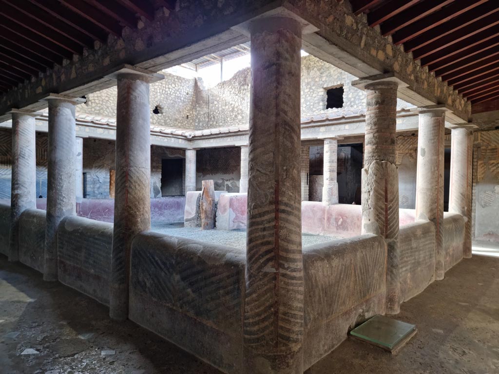 Oplontis Villa of Poppea, January 2023. Room 32, looking south-west across the rustic courtyard. Photo courtesy of Miriam Colomer.

