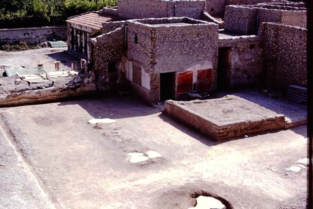 Oplontis Villa of Poppea, 1975. North garden 56, looking south-west towards the painted plaster on exterior walls of room 55, towards the south-east peristyle (no.59).
Area 58, can be seen, on right.  
Photo by Stanley A. Jashemski.   
Source: The Wilhelmina and Stanley A. Jashemski archive in the University of Maryland Library, Special Collections (See collection page) and made available under the Creative Commons Attribution-Non Commercial License v.4. See Licence and use details.
J75f0533
