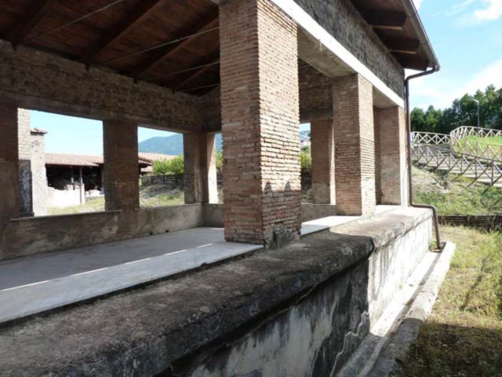Stabiae, Villa Arianna, September 2015. Garden D, looking south along exterior wall of room A, with many windows.