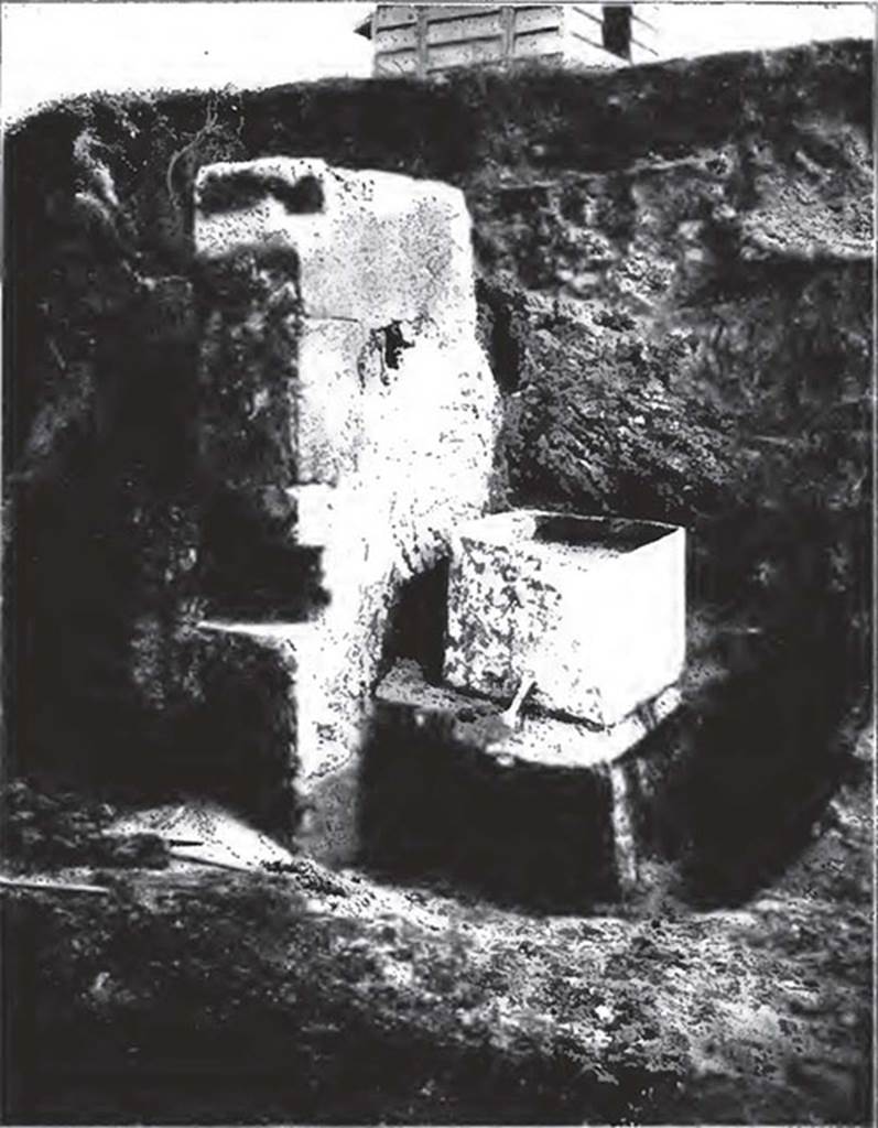 Water column on north-west corner of II.2 on Vicolo di Octavius Quarto. 1916-17.
The top of the water column is shown during excavation. 
On it was found a lead tank which had two pipes, one presumably bringing water in and one to take it out. 
See Notizie degli scavi di antichit: Vol 14, 1917. Roma: Real Accademia dei Lincei. (p. 255).


