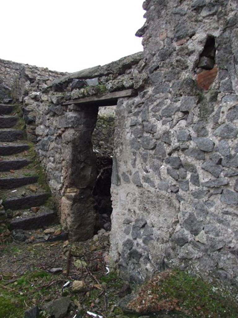 I.8.18 Pompeii. December 2007. Doorway to kitchen 8 on south side of staircase.