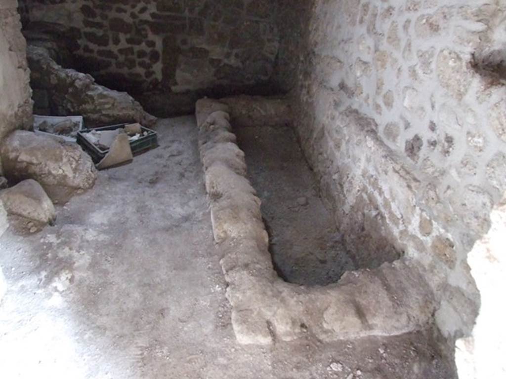 III.2.1 Pompeii. March 2009. 
Room 11, looking towards the south-east corner and south wall with remains of hearth/bench. 
