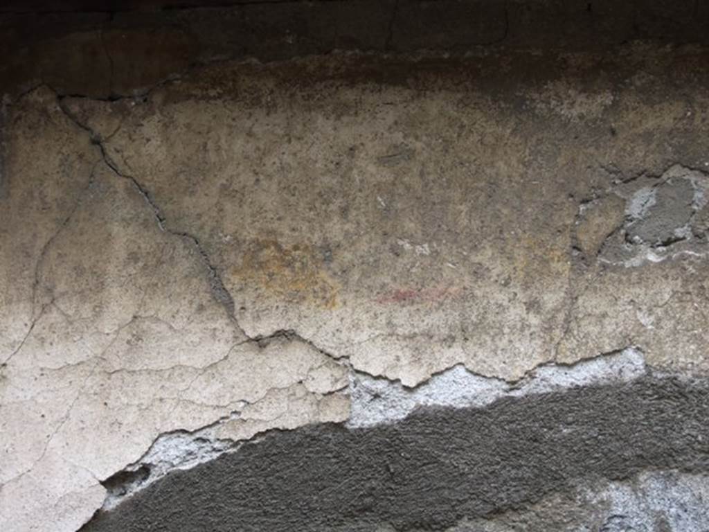 VI.11.9 Pompeii. March 2009. Room 13, kitchen. Detail of painted decoration on square niche on south wall.
Painted on the rear wall was a painting of the Genius, but today faded and no longer recognisable. 
In the front of the niche, there was originally a small brick altar.
See Giacobello, F., 2008. Larari Pompeiani: Iconografia e culto dei Lari in ambito domestico. Milano: LED Edizioni. (p.177)

