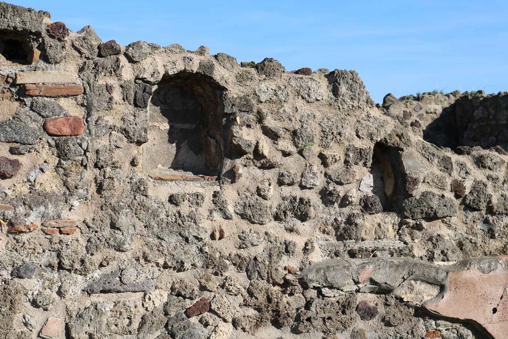 VII.3.3, Pompeii. December 2018. Niche set into east wall of shop. Photo courtesy of Aude Durand.