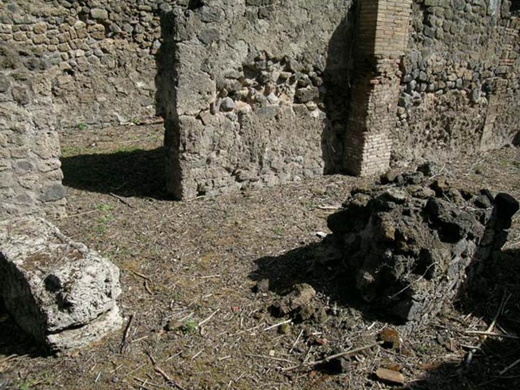 I.1.4 Pompeii. June 2006.Looking across counter/podium towards north wall of shop-room.  Photo courtesy of Nicolas Monteix.
