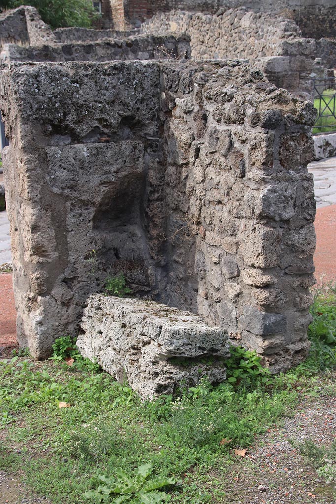 I.1.4 Pompeii. October 2024. 
Detail from north-west corner of shop-room. Photo courtesy of Klaus Heese.
