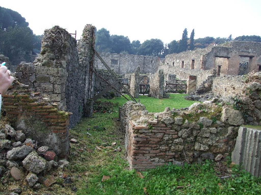 I.2.3 Pompeii. December 2006. Looking west from the garden area along corridor to atrium and entrance of house.

