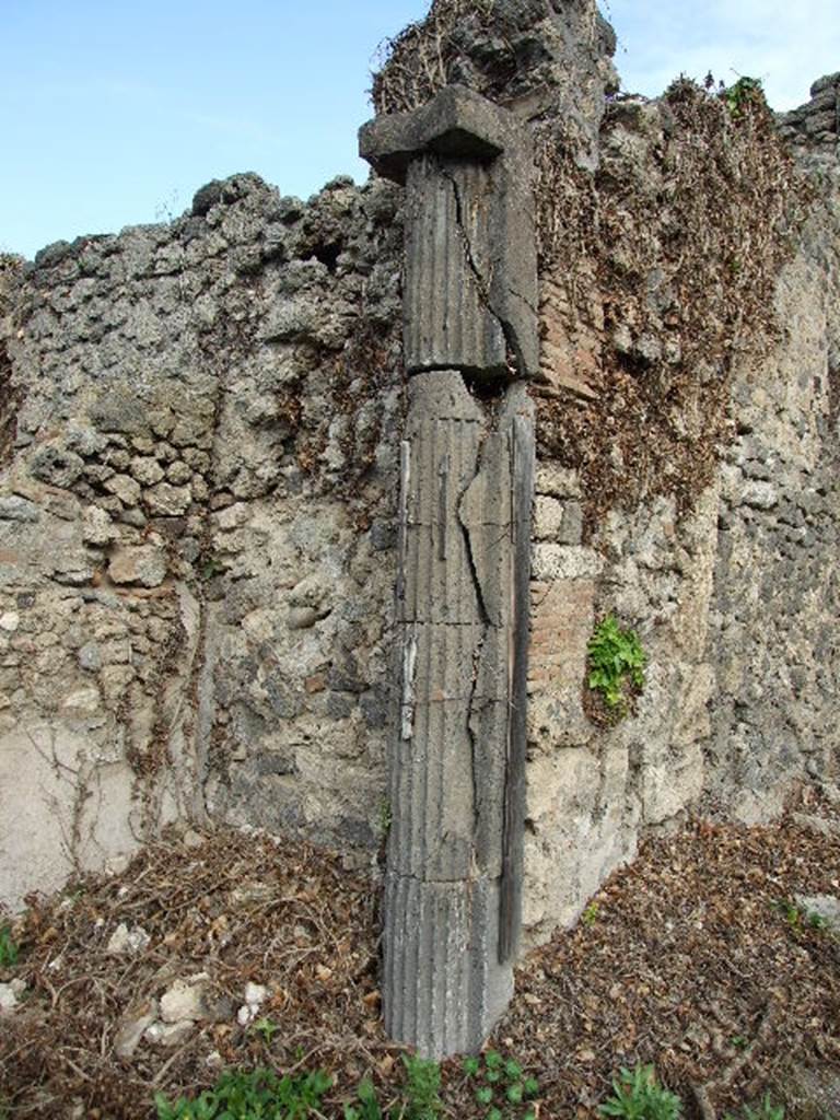 I.2.3 Pompeii. December 2006.  Etruscan Column. According to Jashemski, the small vestibule on the north side of the garden (excavated 1873) was decorated with remnants of tufa columns brought from another site.  See Jashemski, W. F., 1993. The Gardens of Pompeii, Volume II: Appendices. New York: Caratzas. (p.21)
