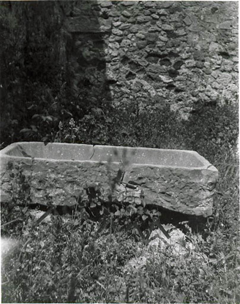 I.2.3 Pompeii. 1935 photo taken by Tatiana Warscher. Warscher described this photo as 
I.2.3 una vasca di lava trovata nel triclinio (h). Forse essa serviva per la coltivazione dei fiori.
See Warscher T., 1935. Codex Topographicus Pompeianus: Regio I.2. (no.12), Rome: DAIR, whose copyright it remains.   
(translation: 1.2.3 a lava basin found in triclinium (h). Perhaps it was used for the cultivation of flowers.)
