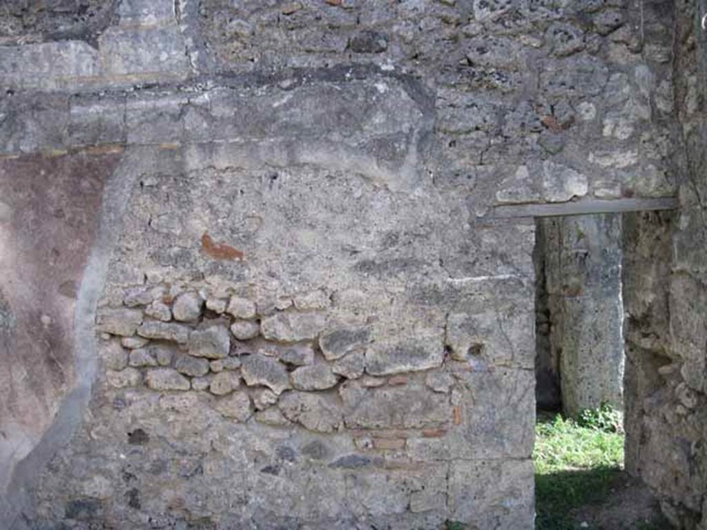 1.2.16 Pompeii. September 2010. Room 4, south wall with doorway into side wall of room 5. Photo courtesy of Drew Baker.
