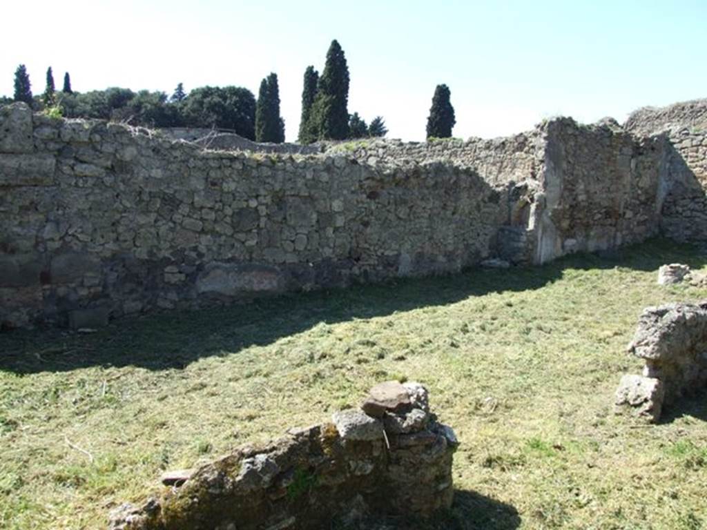 I.2.16 Pompeii. March 2009. Room 6, garden area. Looking north-west from east portico, near room 5. According to Jashemski, the garden was enclosed by a portico on the north and east sides. A low wall connected the columns and pillars of the portico and there was an entrance to the garden on the east side. See Jashemski, W. F., 1993. The Gardens of Pompeii, Volume II: Appendices. New York: Caratzas. (p.22, and fig 18 of the statuette).