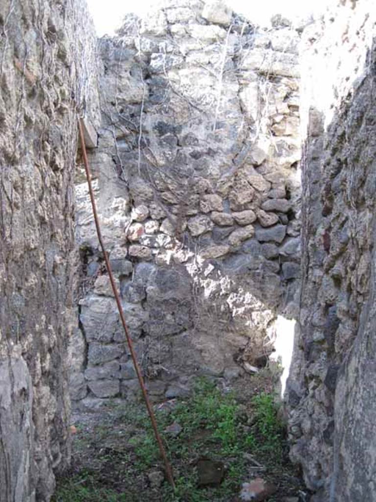 I.2.17 Pompeii. September 2010. Looking north from atrium, into small room 2. On the left can be seen the doorway from the east side of the entrance doorway. Photo courtesy of Drew Baker.
