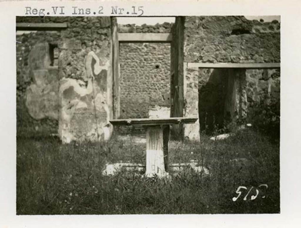 I.2.17 Pompeii but shown as VI.2.15 on the photo. 1937-39. Looking north across impluvium in atrium towards entrance doorway. Photo courtesy of American Academy in Rome, Photographic Archive. Warsher collection no. 515.
