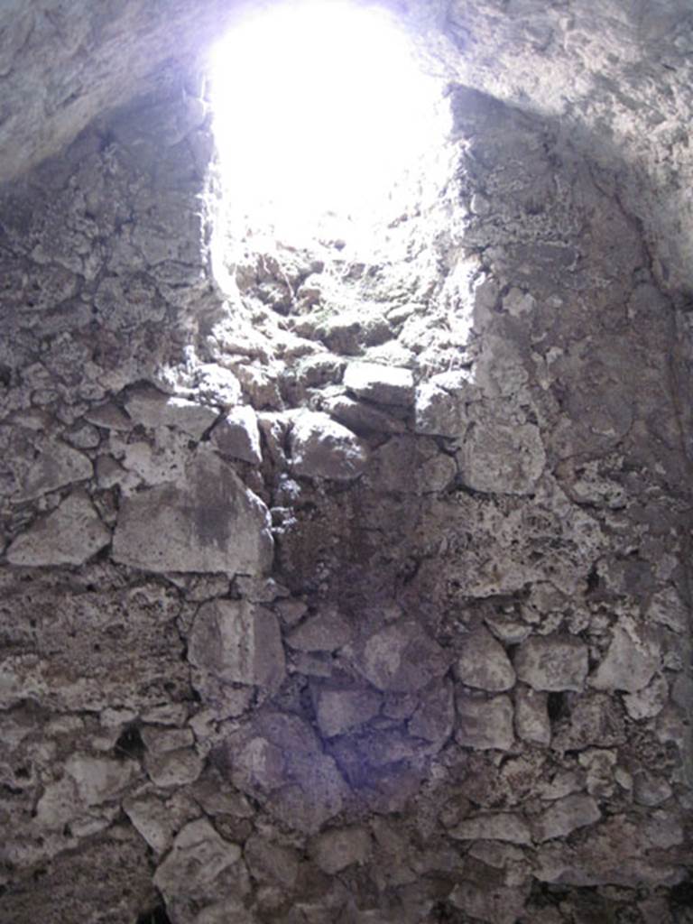 I.3.3 Pompeii. September 2010. East wall of storeroom that received light from vent on west side of upper peristyle. Photo courtesy of Drew Baker.
