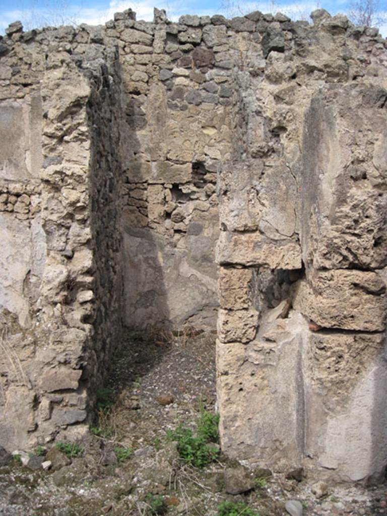 I.3.8b Pompeii. September 2010.  Looking north to doorway to small room, described by Fiorelli as lapotheca. Photo courtesy of Drew Baker.
