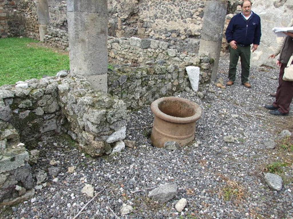 I.3.8b Pompeii. December 2006. Looking north-west across peristyle towards remains of hearth and terracotta puteal.