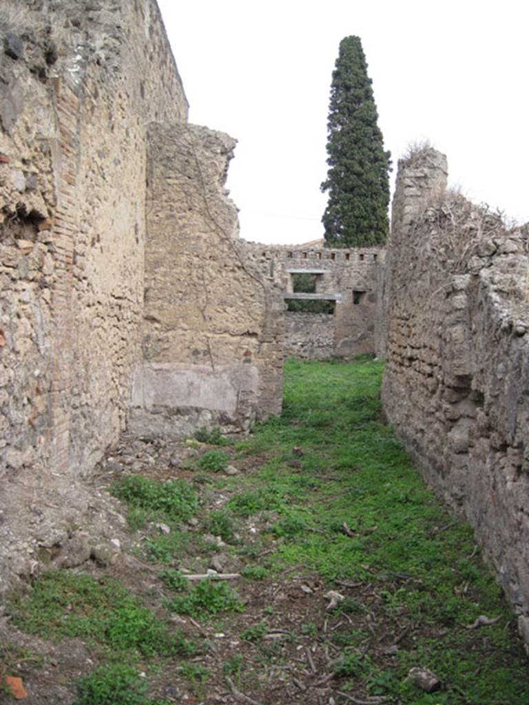 I.3.27 Pompeii. September 2010. Looking towards east wall and doorway of room, and across bakery room towards entrance doorway.  Photo courtesy of Drew Baker.
