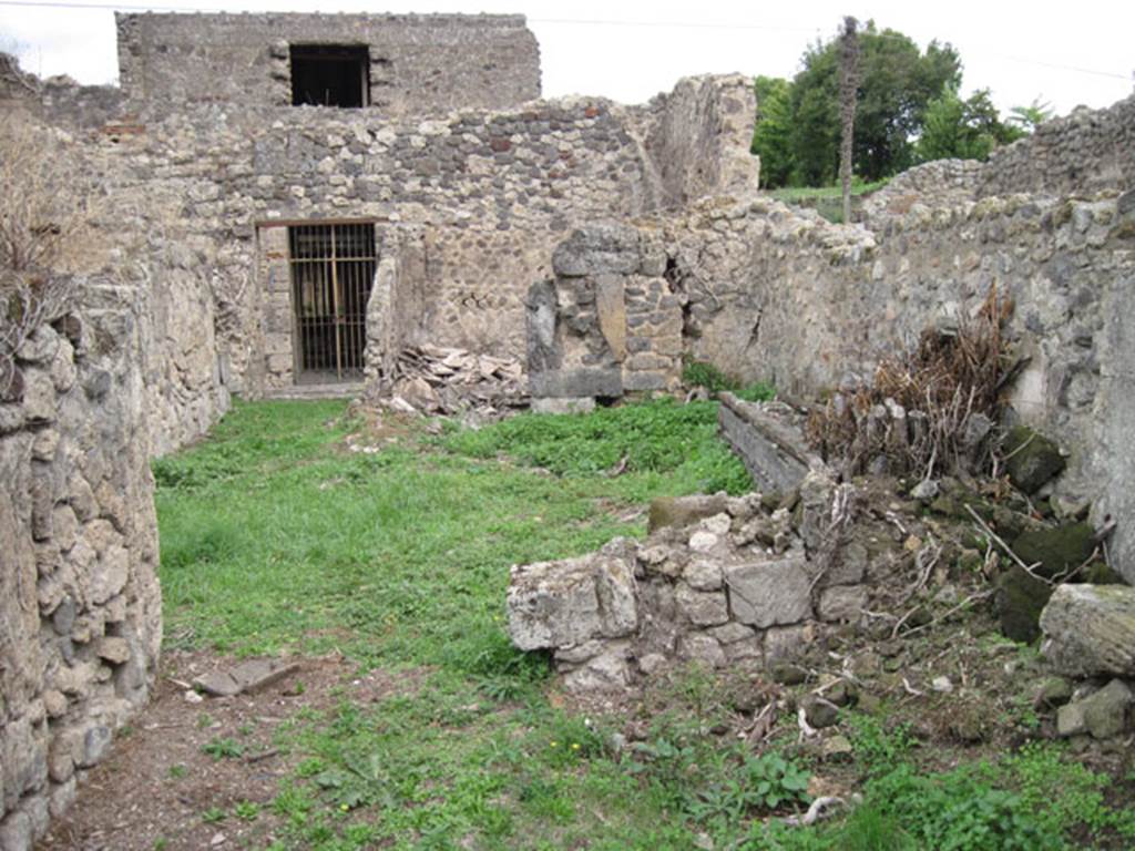 I.3.29 Pompeii. September 2010. Doorway and remains of east wall of room 5. Photo courtesy of Drew Baker.