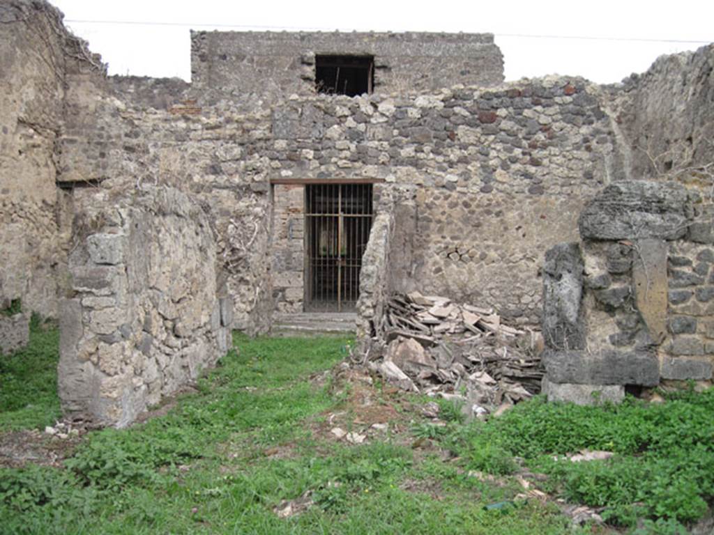 I.3.29 Pompeii. September 2010. Looking east from room 1 the atrium, towards fauces and doorway onto Vicolo del Citarista. The doorways to room 2 on the north side and room 6 on the south side are visible.  Photo courtesy of Drew Baker.
