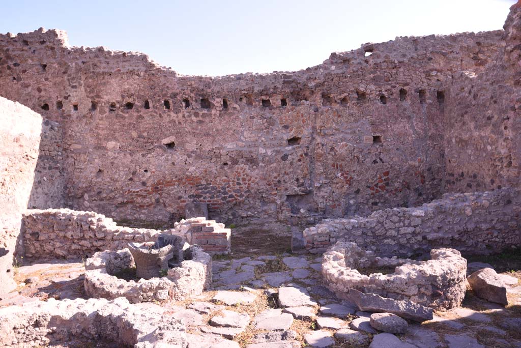 I.4.12 Pompeii. October 2019. Room b, east side of bakery room, with doorway into room f.
Foto Tobias Busen, ERC Grant 681269 DCOR.
