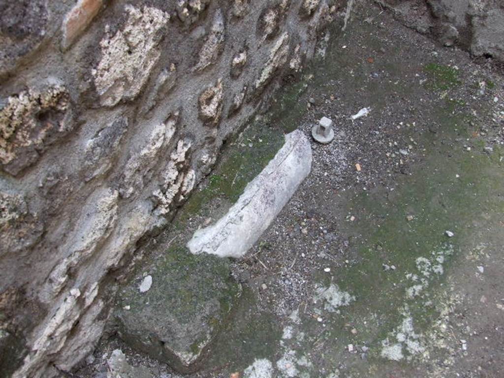 I.4.25 Pompeii. December 2006. Room 47, original lead pipe in bath suite.