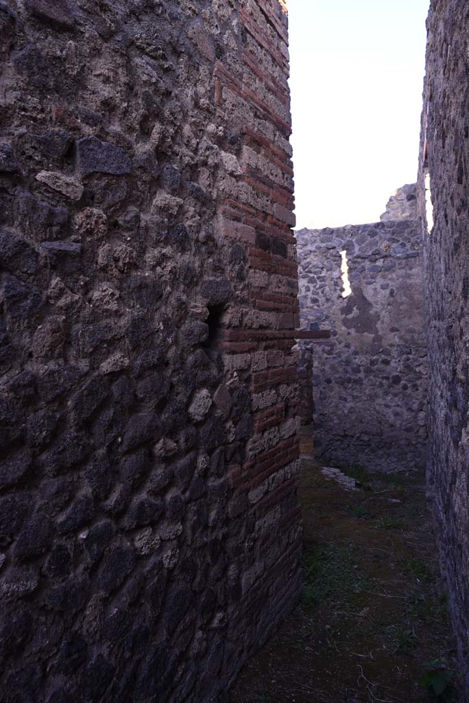 I.4.25 Pompeii. October 2019. 
Room 64, looking north from end of corridor into part of room with doorway to room 63.
Foto Tobias Busen, ERC Grant 681269 DCOR.

