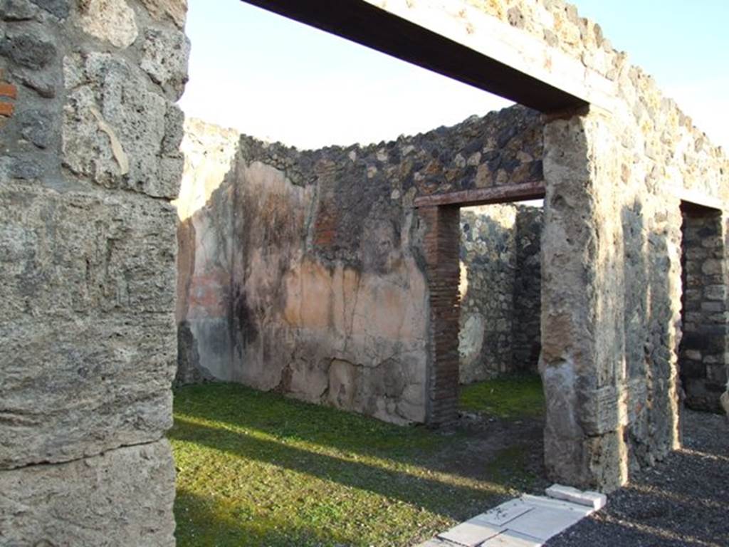 I.4.25 Pompeii. December 2007. 
Doorway to room 58, oecus on east side of upper peristyle with doorway in south wall to cubiculum, room 59.
