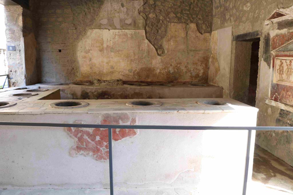 I.8.8 Pompeii. December 2018. Looking across three-sided counter towards east wall. Photo courtesy of Aude Durand.