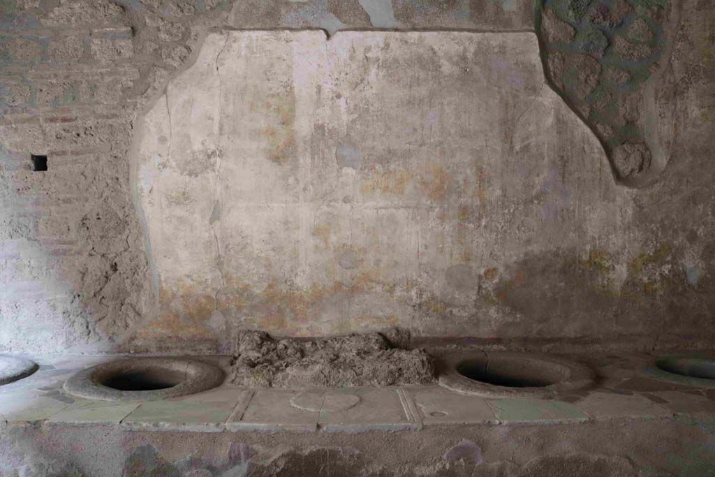 I.8.8 Pompeii. December 2018. Looking towards east wall and top of the counter of the eastern arm. Photo courtesy of Aude Durand