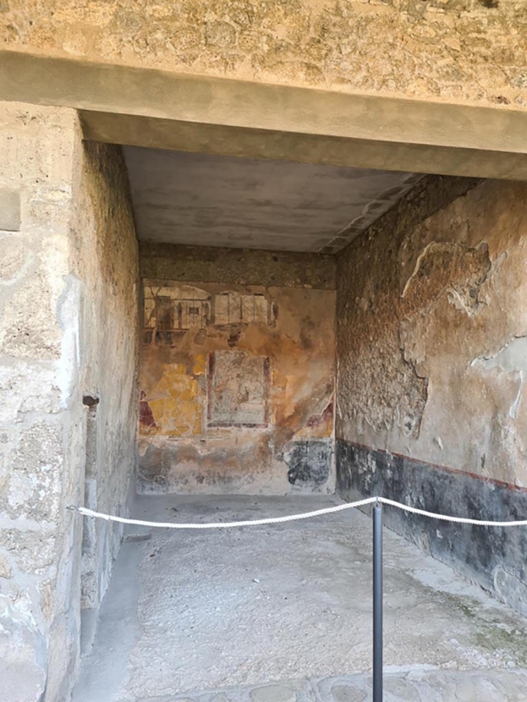 I.8.17 Pompeii. May 2024. Room 18, exedra, looking west from peristyle. Photo courtesy of Klaus Heese.

