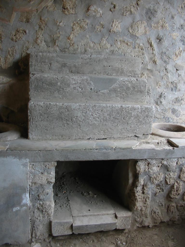 I.9.3 Pompeii. May 2003. Display shelving against west wall. Photo courtesy of Nicolas Monteix.