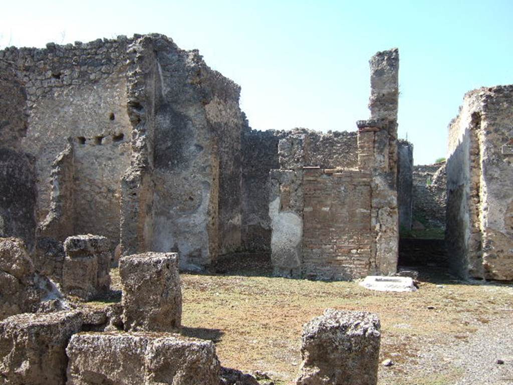 I.9.10 Pompeii. September 2005. Looking west across atrium towards south-west corner.