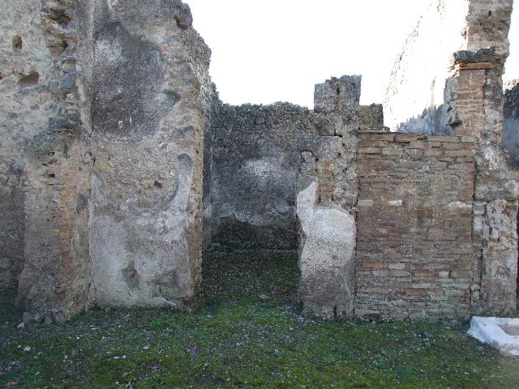 I.9.10 Pompeii. December 2006. Doorway in west wall of atrium leading to enclosed tablinum.   