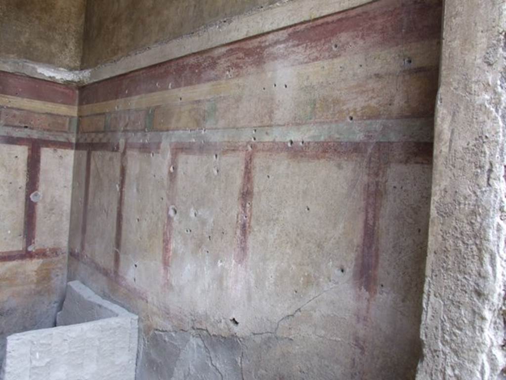 I.9.14 Pompeii. March 2009. Room 13.  West wall, and remains of plaster cast of furniture.