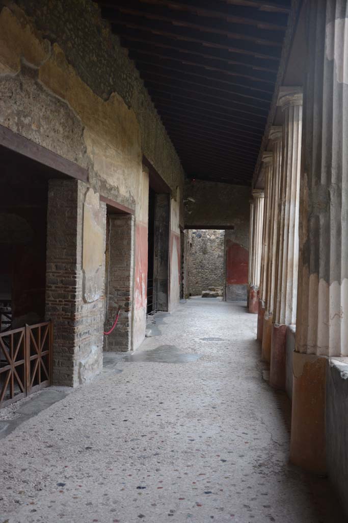 I.10.4 Pompeii. October 2017. 
Looking south along east portico with doorway to room 15, on left, followed by rooms 16 (leading to room 17), 18, 19 and corridor P1.
Foto Annette Haug, ERC Grant 681269 DCOR.
